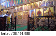 Divine worship inside the Assumption Cathedral of the Valdai Iversky Monastery (2022 год). Редакционное видео, видеограф FotograFF / Фотобанк Лори