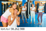 Young woman training chokehold. Стоковое фото, фотограф Яков Филимонов / Фотобанк Лори