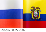 Национальные флаги России и Эквадора крупным планом. Иллюстрация экономических, политических, культурных отношений (2021 год). Стоковое фото, фотограф Лозовая Людмила / Фотобанк Лори