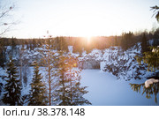 Winter landscape of Ruskeala Park. Marble canyon under the snow. Russia, Republic of Karelia. (2018 год). Редакционное фото, фотограф Photojuli / Фотобанк Лори