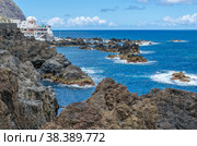 The coastline of volcanic lava in Porto Moniz (2012 год). Стоковое фото, фотограф Михаил Аккуратoв / Фотобанк Лори