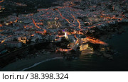 Aerial view of illuminated Nerja city at Mediterranean coast, Costa del Sol, Spain. Стоковое видео, видеограф Яков Филимонов / Фотобанк Лори