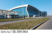 Simferopol, Crimea-September 30, 2019: exterior view of the new modern passenger terminal of Simferopol international airport. View from the square. Редакционное фото, фотограф Оксана Медведева / Фотобанк Лори