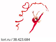 Isolated on white background girl gymnast jumping with red ribbon twisting hearts. Стоковое фото, фотограф Мария Мороз / Фотобанк Лори