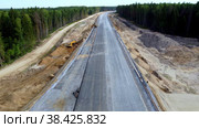 Construction of a toll road Moscow Kazan, highway construction. Стоковое видео, видеограф Скрипачев Антон / Фотобанк Лори