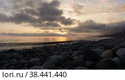 LAZAREVSKOE, SOCHI, RUSSIA - MAY, 26, 2021: Amazing beach sunset over Black Sea. Lazarevskoye, Sochi, Russia. Стоковое фото, фотограф Tae Mi / Фотобанк Лори