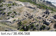 Bird's eye view of Rhodiapolis remains, near Kumluca in Antalya Province, Turkey. Стоковое видео, видеограф Яков Филимонов / Фотобанк Лори