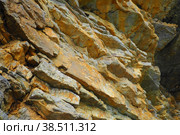 Flysch is a series of marine sedimentary rocks that are predominantly clastic in origin and are characterized by the alternation of several lithological layers. Balkans, Montenegro Herceg Novi Meljine (2022 год). Стоковое фото, фотограф Юлия Петровская / Фотобанк Лори