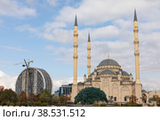 GROZNY, RUSSIA - November 05, 2022: Daily life in Chechen Republic. Main mosque of the Chechen Republic - Akhmad Kadyrov Mosque (Heart of Chechnya) Редакционное фото, фотограф Ирина Михайличенко / Фотобанк Лори