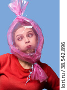 head inside candy wrapper. Стоковое фото, фотограф Lekcej / Фотобанк Лори