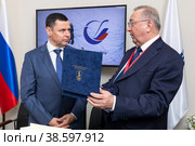 Россия. Санкт-Петербург. Губернатор Ярославской области Дмитрий Миронов и председатель правления и президент ПАО Транснефть Николай Токарев. Russia. Saint-Petersburg. Governor of the Yaroslavl Region Dmitry Mironov and Chairman of the Management Board and President of Transneft Nikolay Tokarev. (2021 год). Редакционное фото, фотограф Алексей Смышляев / Фотобанк Лори