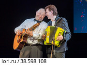 Россия. Санкт-Петербург. Юбилейный вечер Юрия Гальцева в Театре Эстрады. Артист, художественный руководитель Театра Эстрады имени Райкина Юрий Гальцев и артист Геннадий Ветров. Russia. Saint-Petersburg. Yuri Galtsev's anniversary evening at the Variety Theater. Artist, artistic director of the Raikin Variety Theater Yuri Galtsev and artist Gennady Vetrov. (2021 год). Редакционное фото, фотограф Алексей Смышляев / Фотобанк Лори