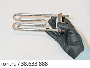 Fragment of the heating element of the washing machine. Стоковое фото, фотограф Siarhei Starastau / Фотобанк Лори