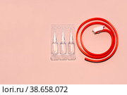 Antiparasitic collar and product in flea drops for cats and dogs on the background with a copy of the space. Prevention against blood-sucking insects fleas and ticks. Стоковое фото, фотограф Коханова Наталья / Фотобанк Лори
