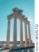 The ruins of the ancient temple of Apollo in the city of Side, Antalya province, Turkey against the blue sky (2023 год). Стоковое фото, фотограф Ярославский Максим / Фотобанк Лори