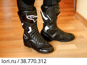 KRASNOYARSK, RUSSIA - February 06, 2018: Alpinestars SMX 6. Girl in a sports motorcycle boots. Стоковое фото, фотограф Плотников Дмитрий / Фотобанк Лори