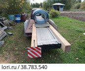 Прицеп со стройматериалами (2022 год). Редакционное фото, фотограф Максим Михайлов / Фотобанк Лори
