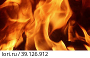 Flame of fire in firebox of home wood stove, slow mo. Стоковое видео, видеограф Владимир Григорьев / Фотобанк Лори