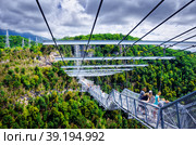 Sochi, Russia - August 15, 2016: SKYPARK AJ Hackett Sochi is located in the Sochi National Park. The longest suspension footbridge in the world. Редакционное фото, фотограф Elena Titova / Фотобанк Лори