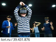 Boy child playfully poses in virtual reality glasses. Стоковое фото, фотограф Яков Филимонов / Фотобанк Лори