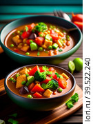 Vegetable stew with eggplant and zucchini on a wooden background. Стоковая иллюстрация, иллюстратор Марина Володько / Фотобанк Лори