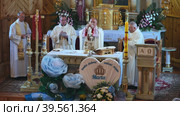 Trokeli, Belarus - April 17, 2022: A Catholic bishop service in the village of Trokeli. Стоковое видео, видеограф Mikhail Davidovich / Фотобанк Лори