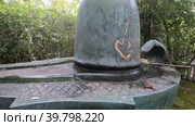 Video of bronze Shiva Linga in Toganji temple. Symbol of lingam-yoni. Nagoya. Japan. Стоковое видео, видеограф Сергей Пристяжнюк (Serg Zastavkin) / Фотобанк Лори