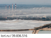 Химическое производство: Башкирская содовая компания, вид на очистные сооружения с горы Куштау. Chemical prodaction: Bashkir Soda Company, view of the sewage treatment from Kushtau Mount. Стоковое фото, фотограф Евгений Романов / Фотобанк Лори