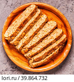 Sliced fresh raw tempeh, traditional Indonesian food. Стоковое фото, фотограф Татьяна  Бральнина / Фотобанк Лори