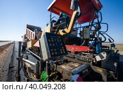 Kyzylorda province, Kazakhstan, April 29, 2012: Construction of West Europe-West China new highway. Dynapac road machine control panel. Стоковое фото, фотограф Alexey Rezvykh / Фотобанк Лори