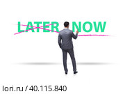 Concept of procrastination with now or later. Стоковое фото, фотограф Elnur / Фотобанк Лори