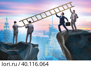 Business people helping to go over chasm. Стоковое фото, фотограф Elnur / Фотобанк Лори