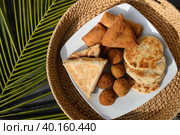 Sri Lankan different street food, vegetable and coconut roti, cutlets, snack. Стоковое фото, фотограф Светлана Лажко / Фотобанк Лори