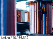 Production of copper wire, cable in reels at factory. Cable factory. Стоковое фото, фотограф Сергей Толмачёв / Фотобанк Лори