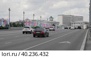 MOSCOW, RUSSIA - MAY 22, 2022: Pashkov's house in Moscow and cars drive down the street. Стоковое фото, фотограф Фотограф / Фотобанк Лори