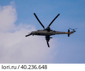 ZHUKOVSKY, RUSSIA - SEPTEMBER 01, 2019: Demonstration of the Mi-35 attack helicopter of the Russian Air Force at MAKS-2019, Russia. Стоковое фото, фотограф Фотограф / Фотобанк Лори