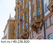 Wrapped around flagpole flag of the USA in Russia Moscow (2018 год). Стоковое фото, фотограф Фотограф / Фотобанк Лори
