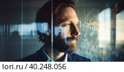 A portrait of thinkful businessman, glass reflections or double exposure, AI generative image. Стоковое AI-изображение, AI-художник Сергей Старуш / Фотобанк Лори