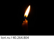 Burning candle on black background. Стоковое фото, фотограф Корнеев Вячеслав / Фотобанк Лори