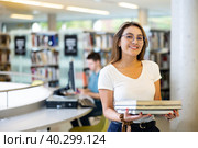 View on a young Latina student holding books. Стоковое фото, фотограф Яков Филимонов / Фотобанк Лори