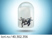 Businessman trapped in transparent glass. Стоковое фото, фотограф Elnur / Фотобанк Лори