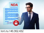 Businessman in non disclosure agreement concept. Стоковое фото, фотограф Elnur / Фотобанк Лори