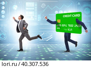 Businessman in the credit card debt concept. Стоковое фото, фотограф Elnur / Фотобанк Лори