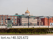 The Russian Orthodox Cathedral is the Cathedral of Christ the Savior in Moscow on a spring day. Russian Federation, Moscow. (2023 год). Редакционное фото, фотограф Photojuli / Фотобанк Лори