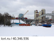 Ремонтный состав въезжающий на железнодорожный мост. Химки, Московская область (2023 год). Редакционное фото, фотограф Фадеева Татьяна / Фотобанк Лори
