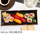 Popular Japanese dish sushi combo, which includes of Uramakis, Makis and Nigiris. Стоковое фото, фотограф Яков Филимонов / Фотобанк Лори
