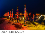 Бурятские столбы с ленточками на Байкале ночью (2021 год). Стоковое фото, фотограф Катя Полякова / Фотобанк Лори