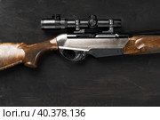 Smoothbore hunting gun on black background close up. Стоковое фото, фотограф Сергей Толмачёв / Фотобанк Лори