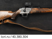 Smoothbore hunting gun on black background close up. Стоковое фото, фотограф Сергей Толмачёв / Фотобанк Лори