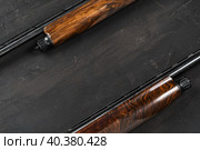 Smoothbore hunting gun on black background close up. Стоковое фото, фотограф Сергей Толмачёв / Фотобанк Лори